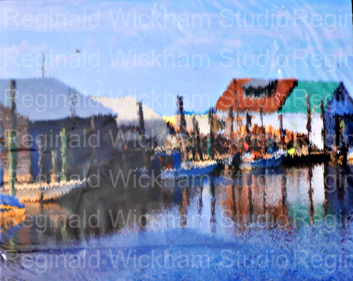 Blurrily developed photograph of a small boat town harbor