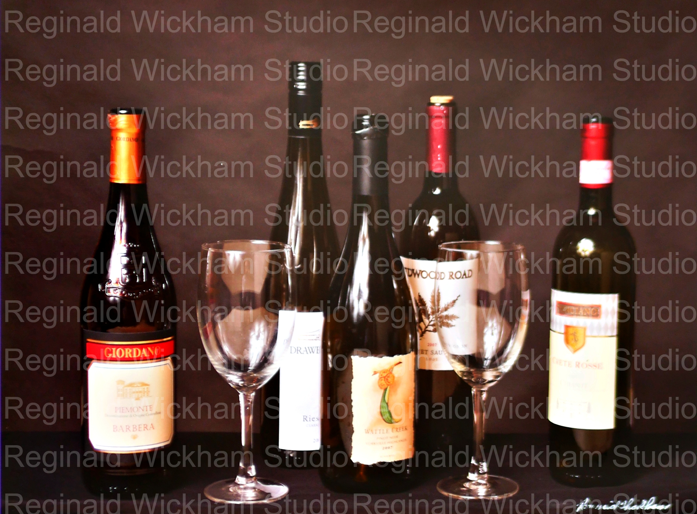 Beautifully edited photograph of wine bottles and glasses arranged on tabletop